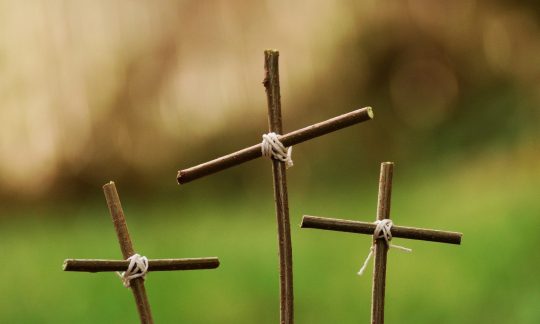 Three wooden crosses
