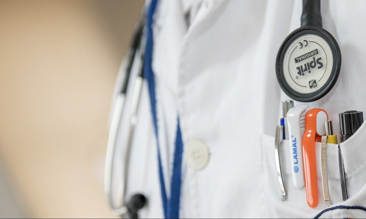 Stethoscope and pens