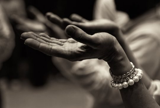 Raised hands