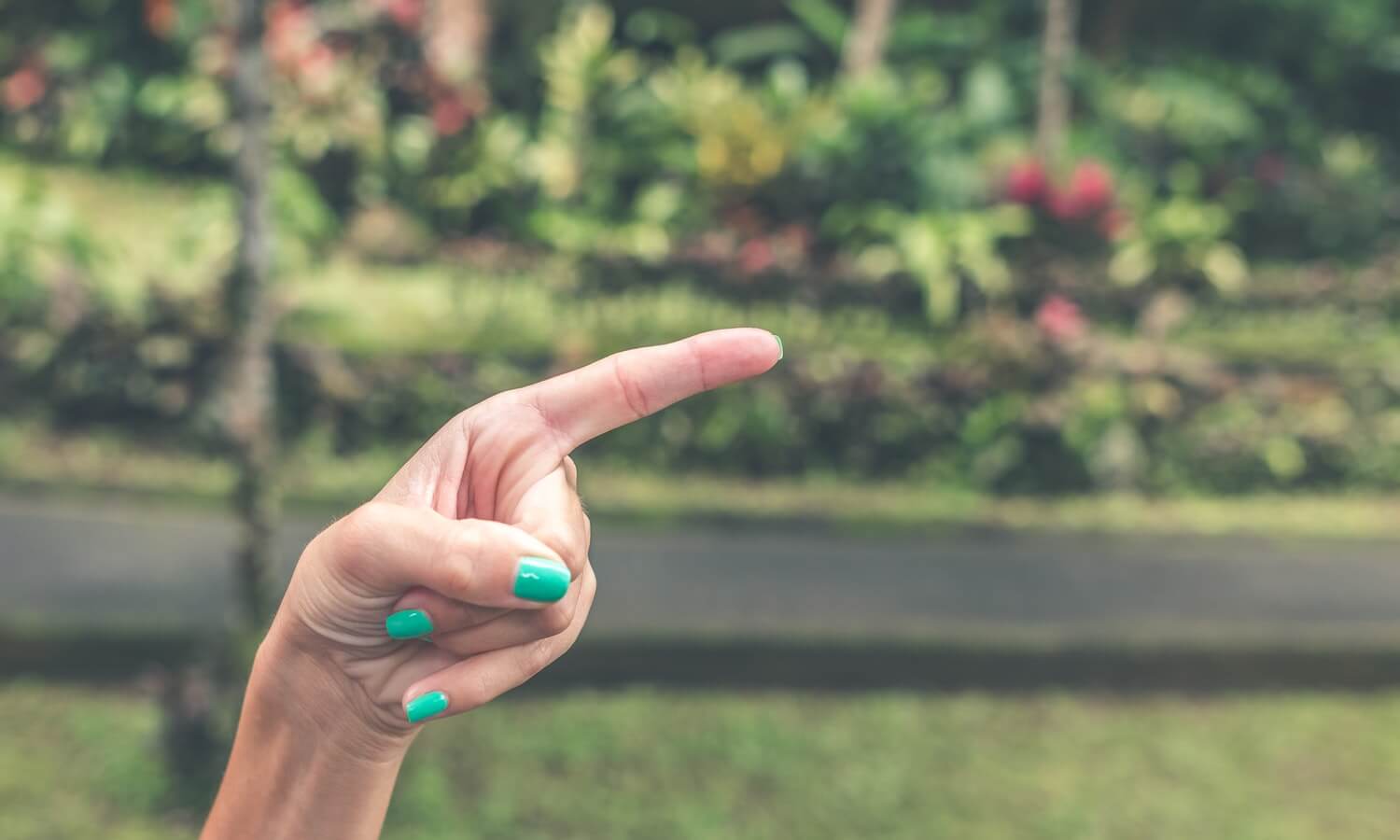 pointing-hand-of-a-white-woman