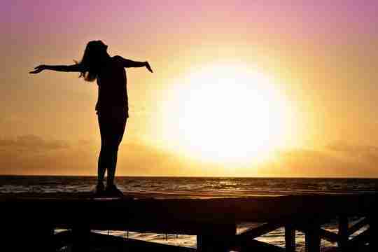 silhouette-photo-of-woman-against-during-golden-hour