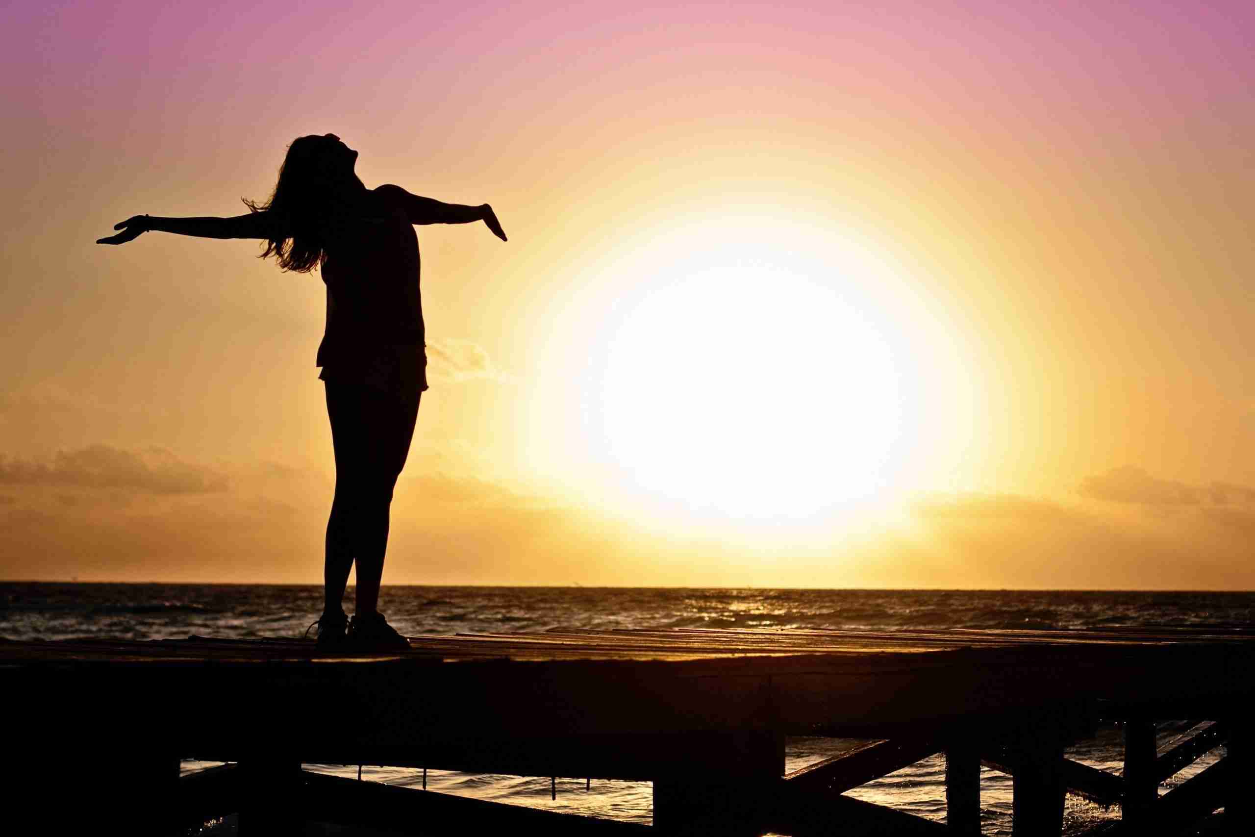 silhouette-photo-of-woman-against-during-golden-hour