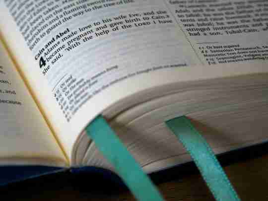 close-up-photo-of-book-page-with-green-book-mark