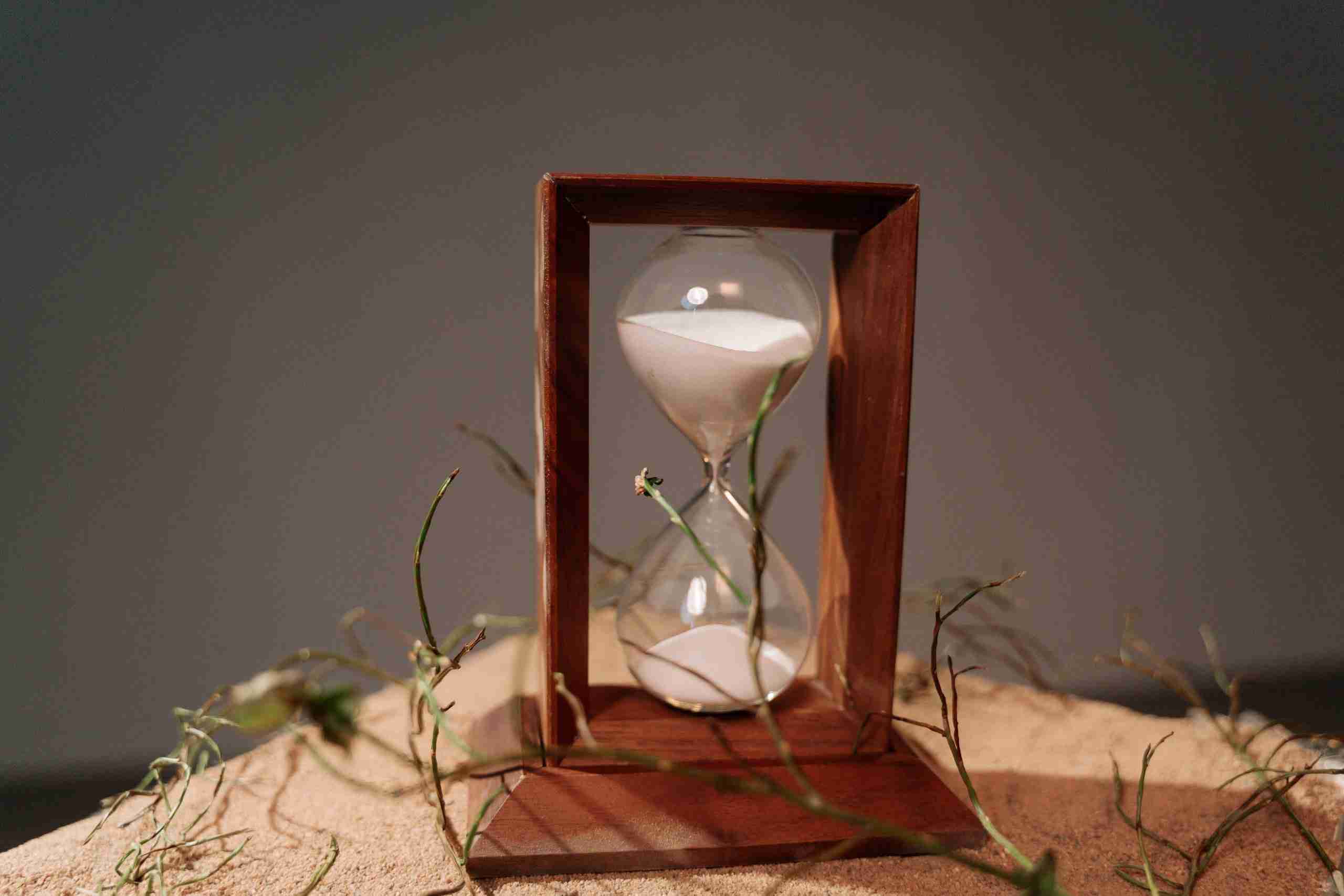 brown-wooden-framed-hour-glass