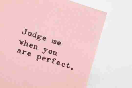 typed-message-on-pink-paper-