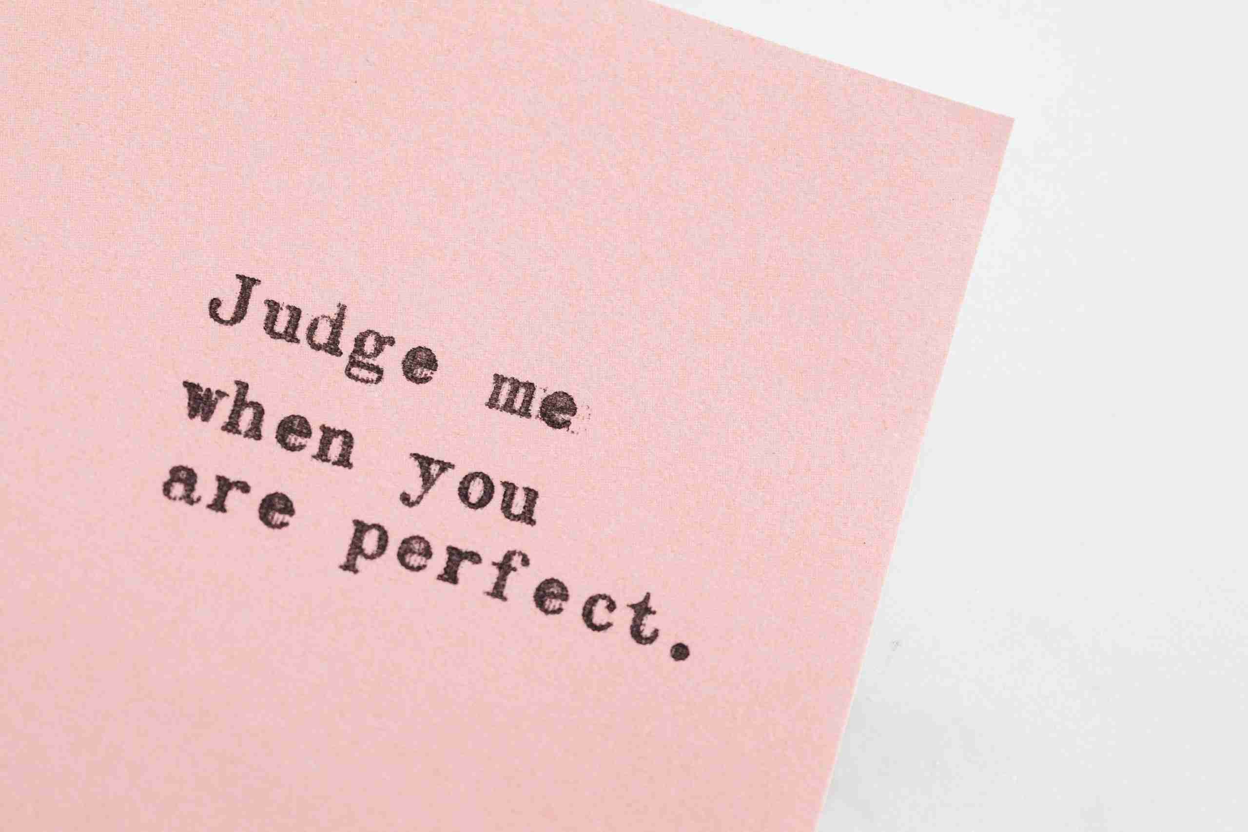 typed-message-on-pink-paper-