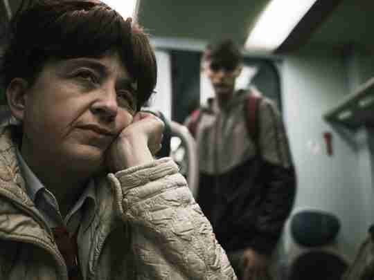 bored-woman-riding-underground-train